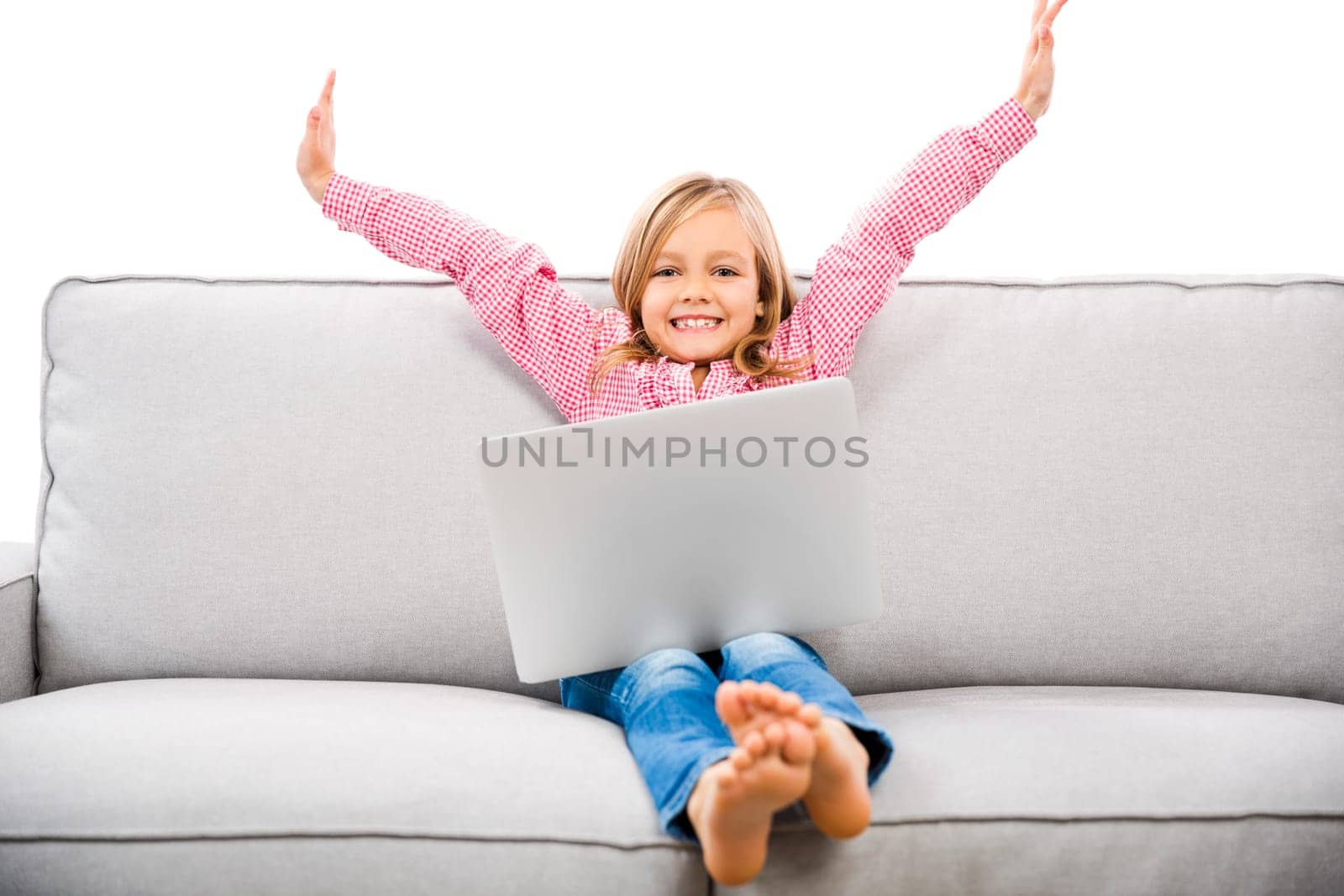 Cute little girl at home studying