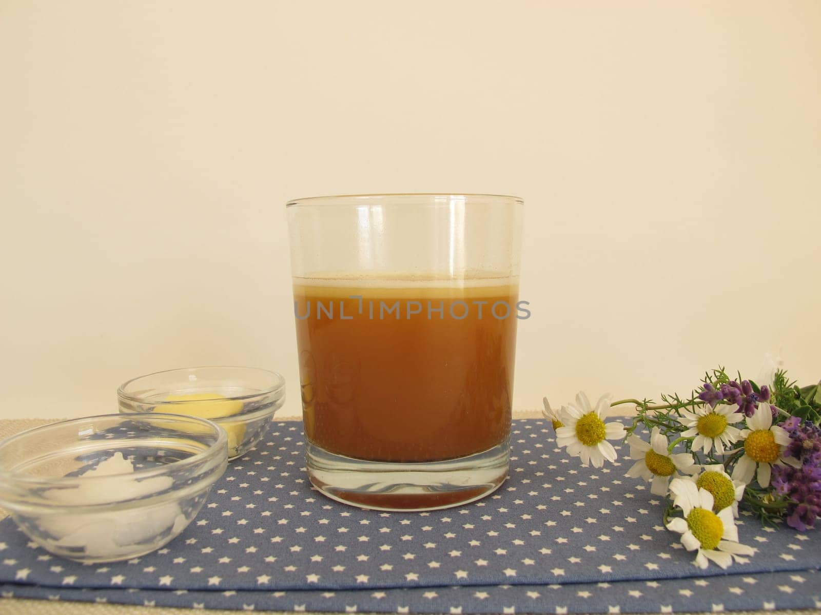 Butter coffee in a glass with butter and coconut oil