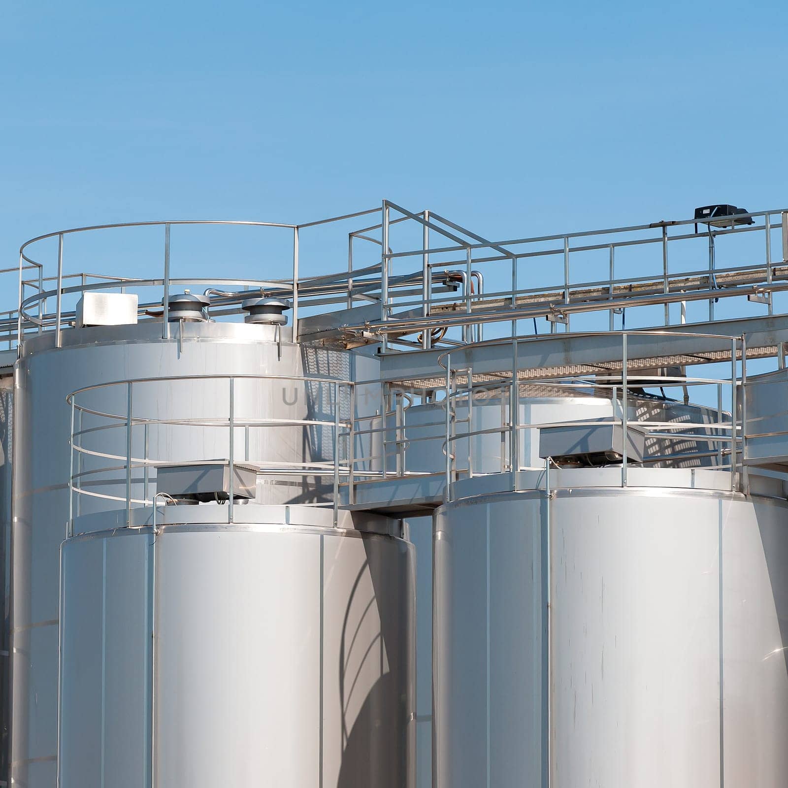 Stainless steel silos . For a milk processing plant.