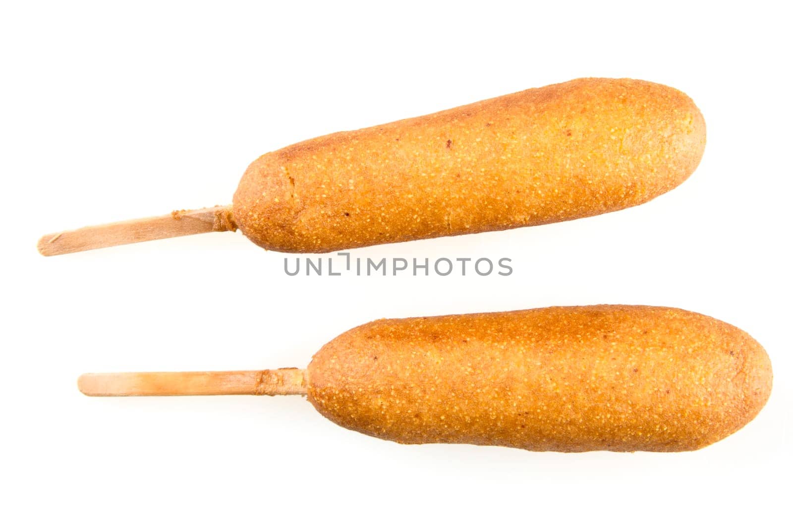 Two corn dogs isolated on white background.