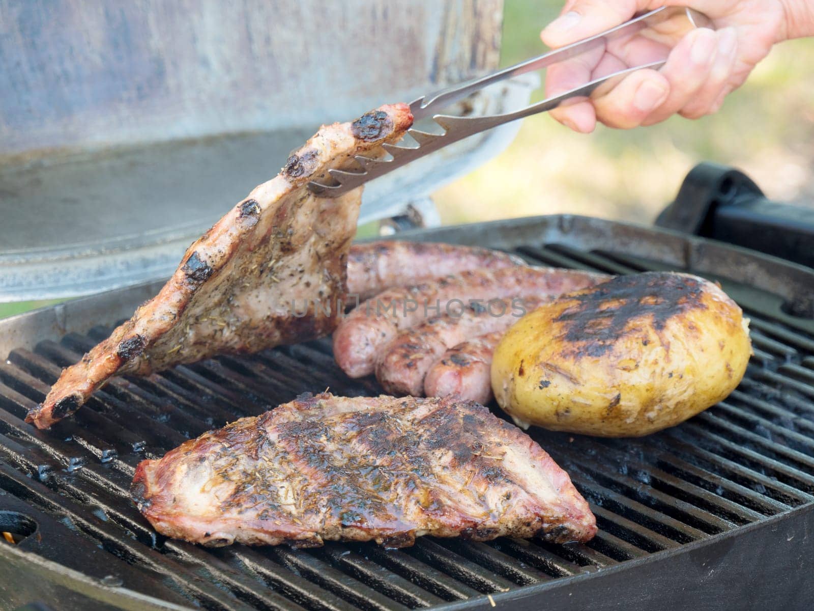 different grilled meat on the barbecue