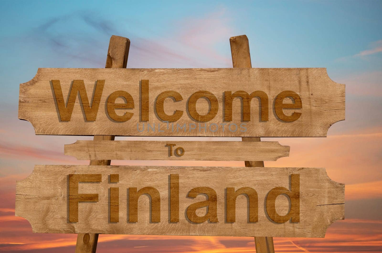 welcome to finland sing on wood background