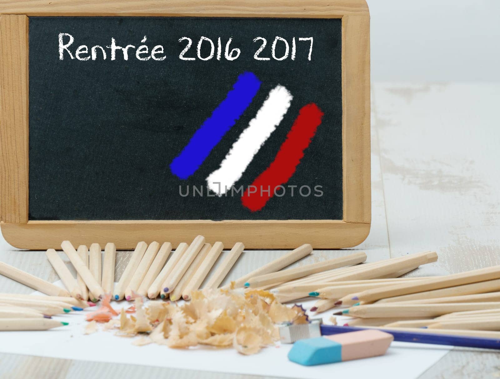 " rentree 2016 2017"""" back to school written on green blackboard"