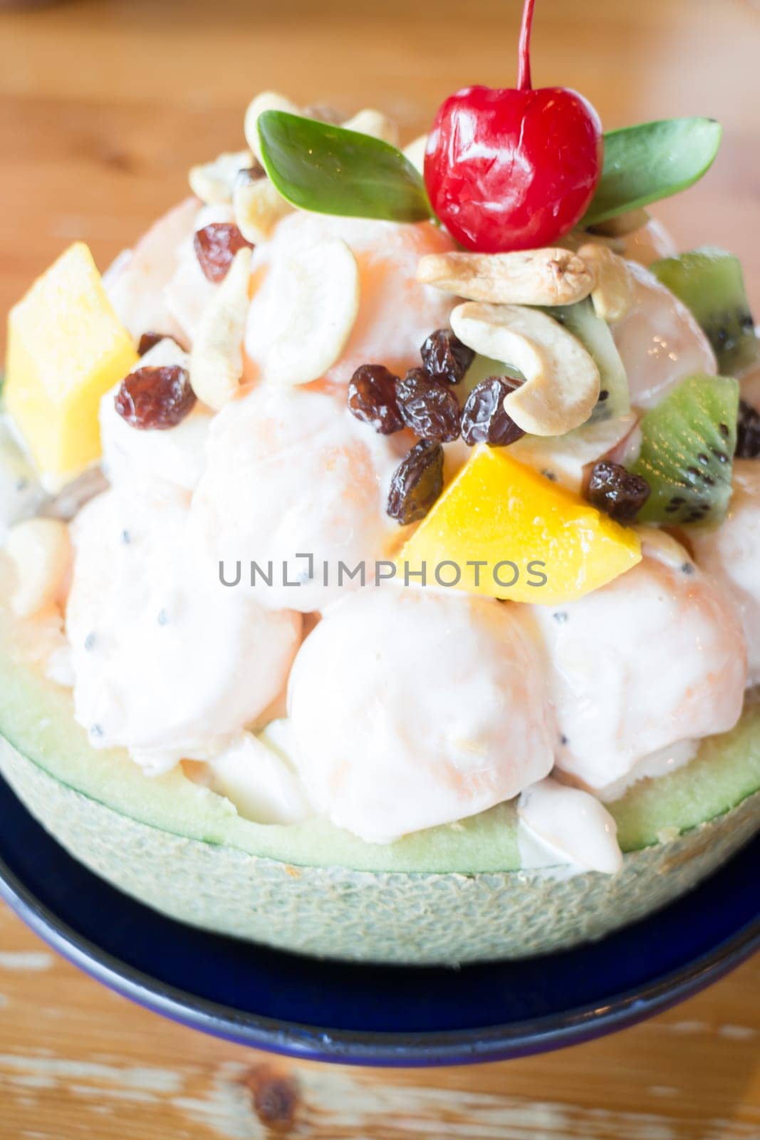 Healthy fruit salad with yoghurt, stock photo
