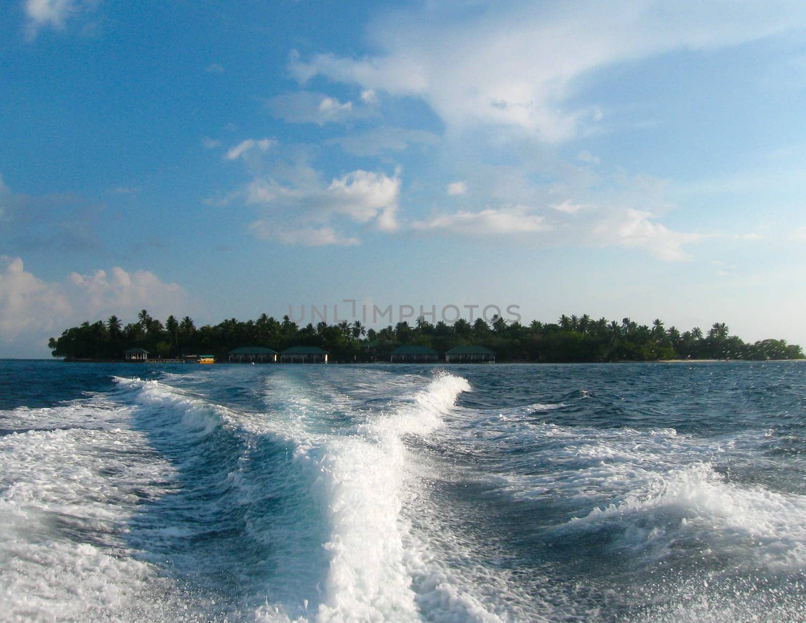 Over water bungalows and the blue sea and sky