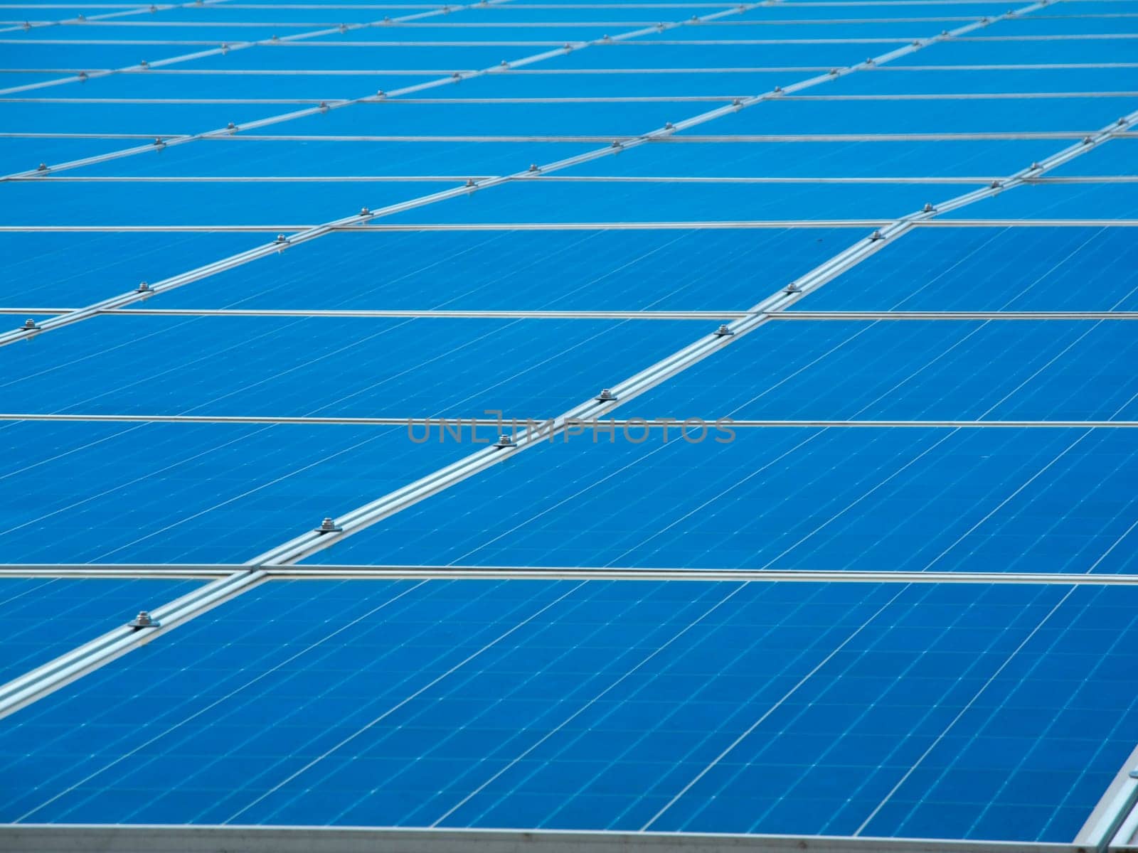 Photovoltaic system with blue sky and scattered clouds