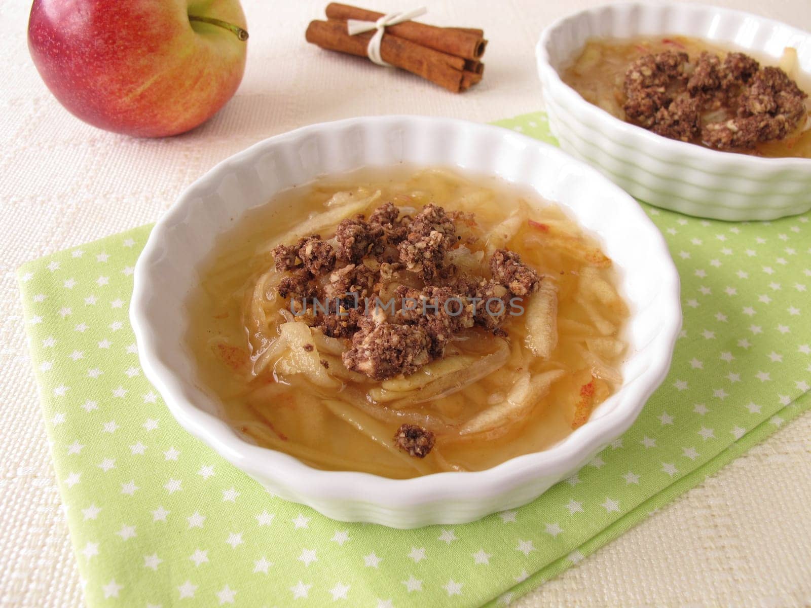 Apple soup with cinnamon and chocolate crumbles