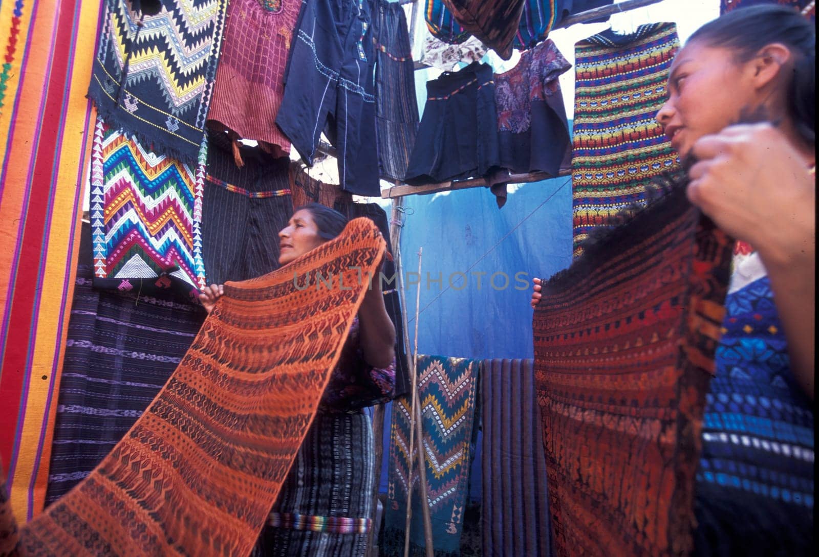People in traditional clotes at the Market in the Village of Chichi or Chichicastenango in Guatemala in Central America.