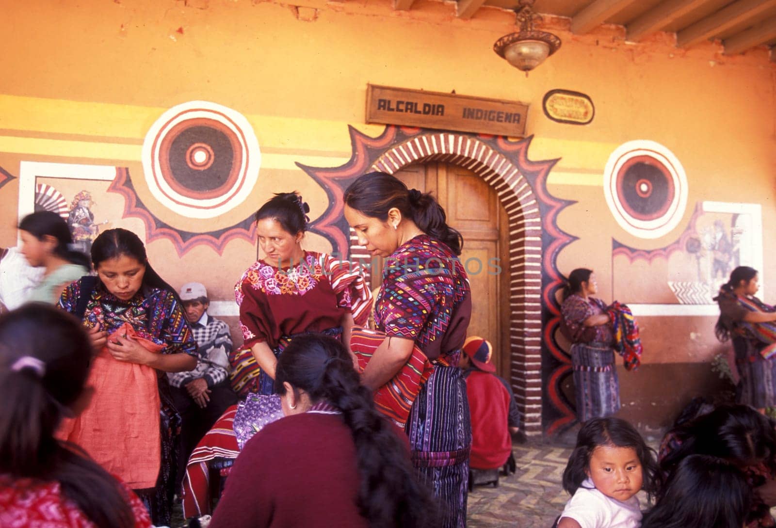 People in traditional clotes at the Market in the Village of Chichi or Chichicastenango in Guatemala in Central America.