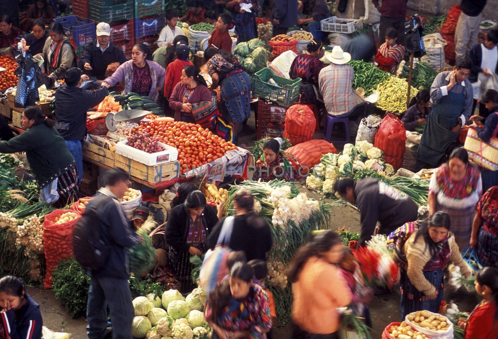 People in traditional clotes at the Market in the Village of Chichi or Chichicastenango in Guatemala in Central America.