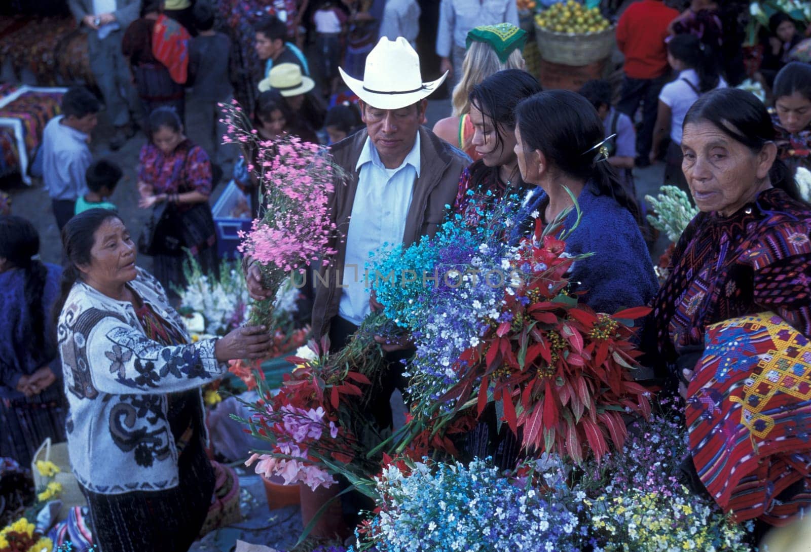 People in traditional clotes at the Market in the Village of Chichi or Chichicastenango in Guatemala in Central America.
