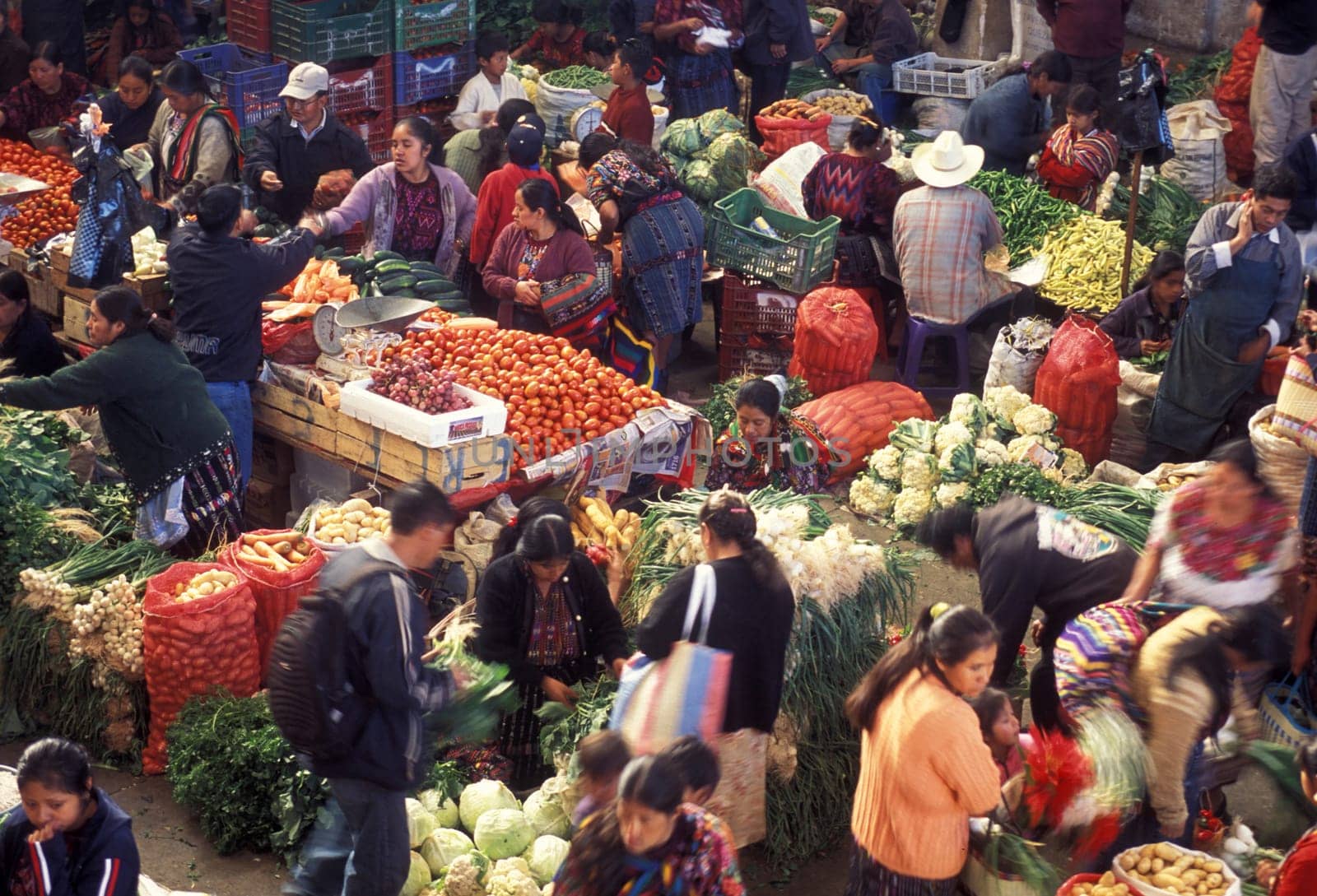 People in traditional clotes at the Market in the Village of Chichi or Chichicastenango in Guatemala in Central America.