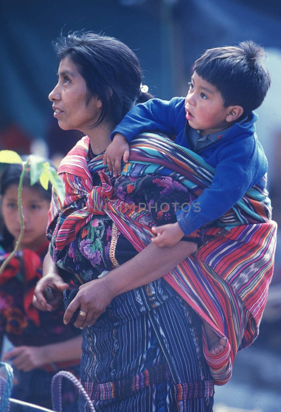 people in traditional clotes at the Market in the Village of  Chichi or Chichicastenango in Guatemala in central America.