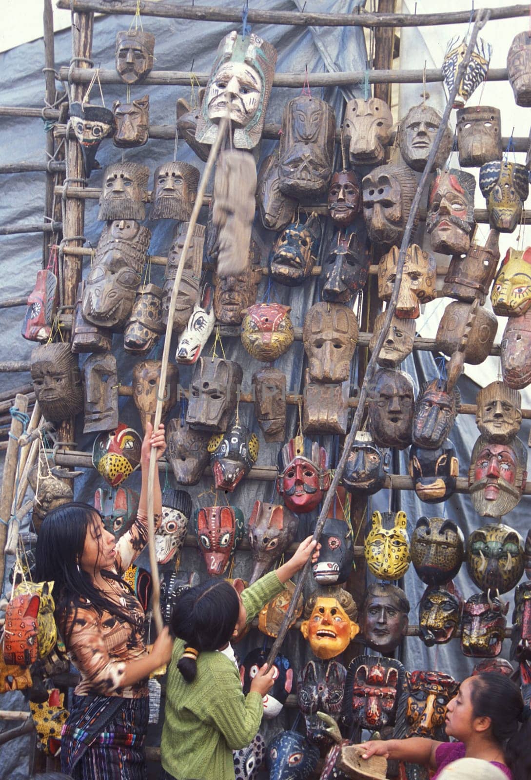 People in traditional clotes at the Market in the Village of Chichi or Chichicastenango in Guatemala in Central America.