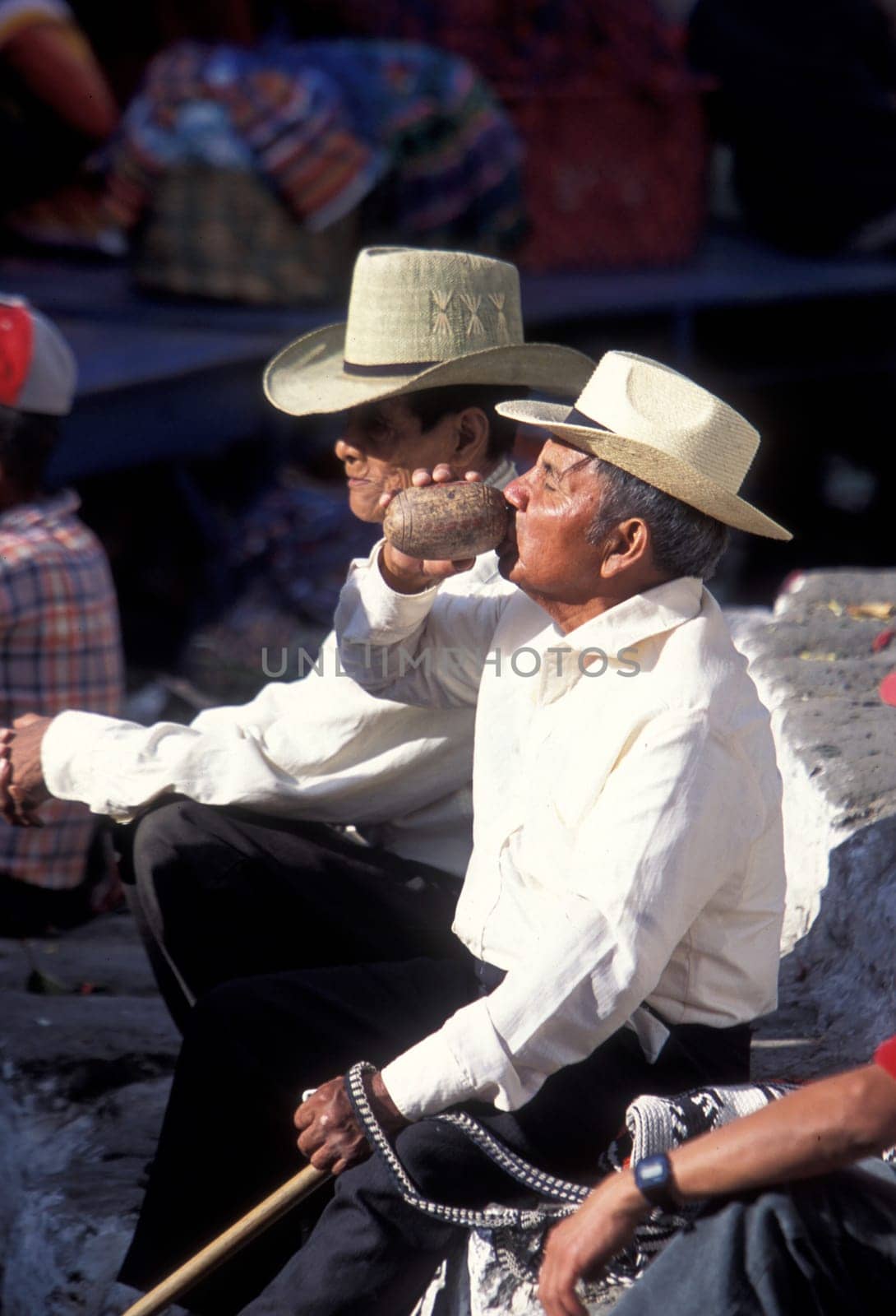 People in traditional clotes at the Market in the Village of Chichi or Chichicastenango in Guatemala in Central America.