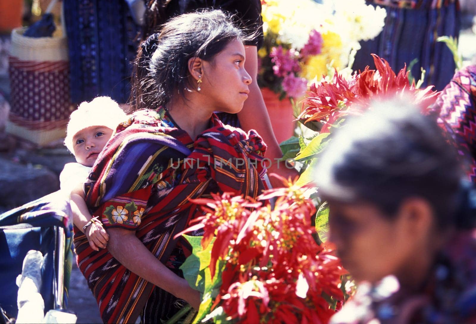 People in traditional clotes at the Market in the Village of Chichi or Chichicastenango in Guatemala in Central America.
