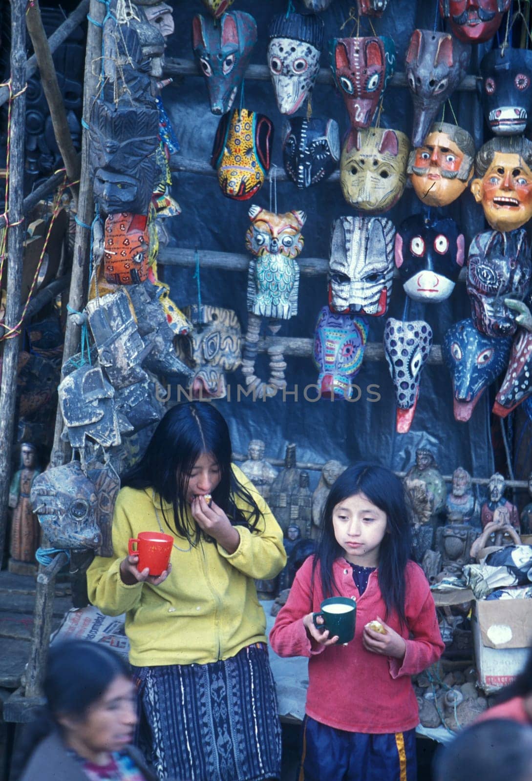 People in traditional clotes at the Market in the Village of Chichi or Chichicastenango in Guatemala in Central America.