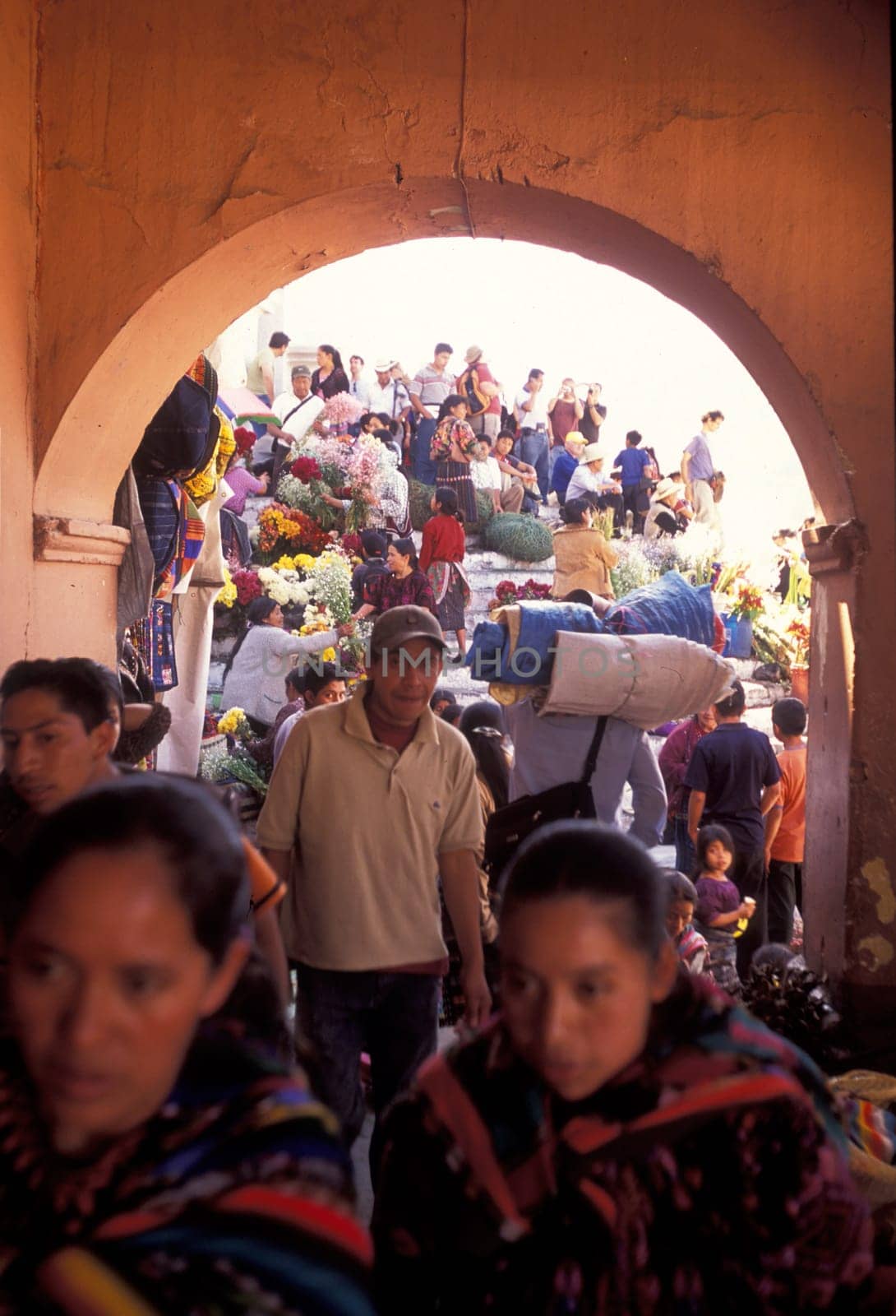 People in traditional clotes at the Market in the Village of Chichi or Chichicastenango in Guatemala in Central America.