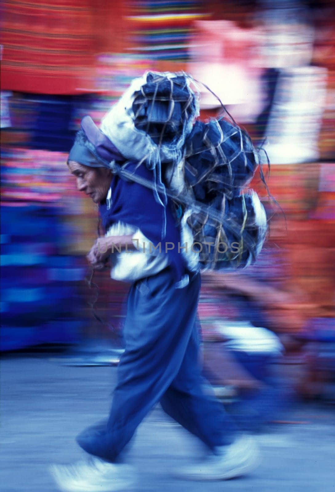 People in traditional clotes at the Market in the Village of Chichi or Chichicastenango in Guatemala in Central America.
