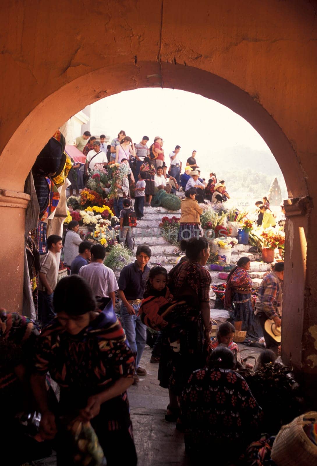 People in traditional clotes at the Market in the Village of Chichi or Chichicastenango in Guatemala in Central America.