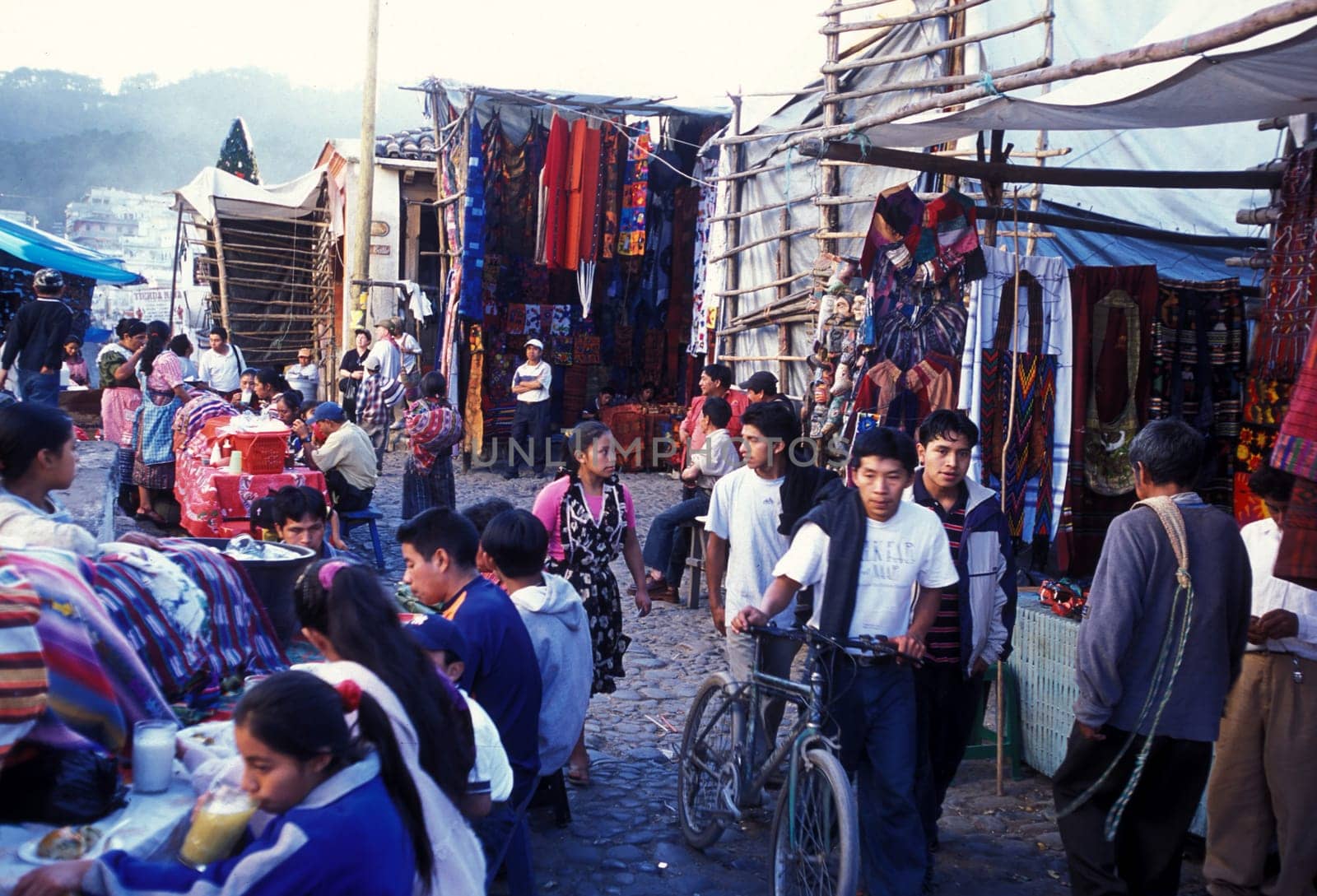 People in traditional clotes at the Market in the Village of Chichi or Chichicastenango in Guatemala in Central America.