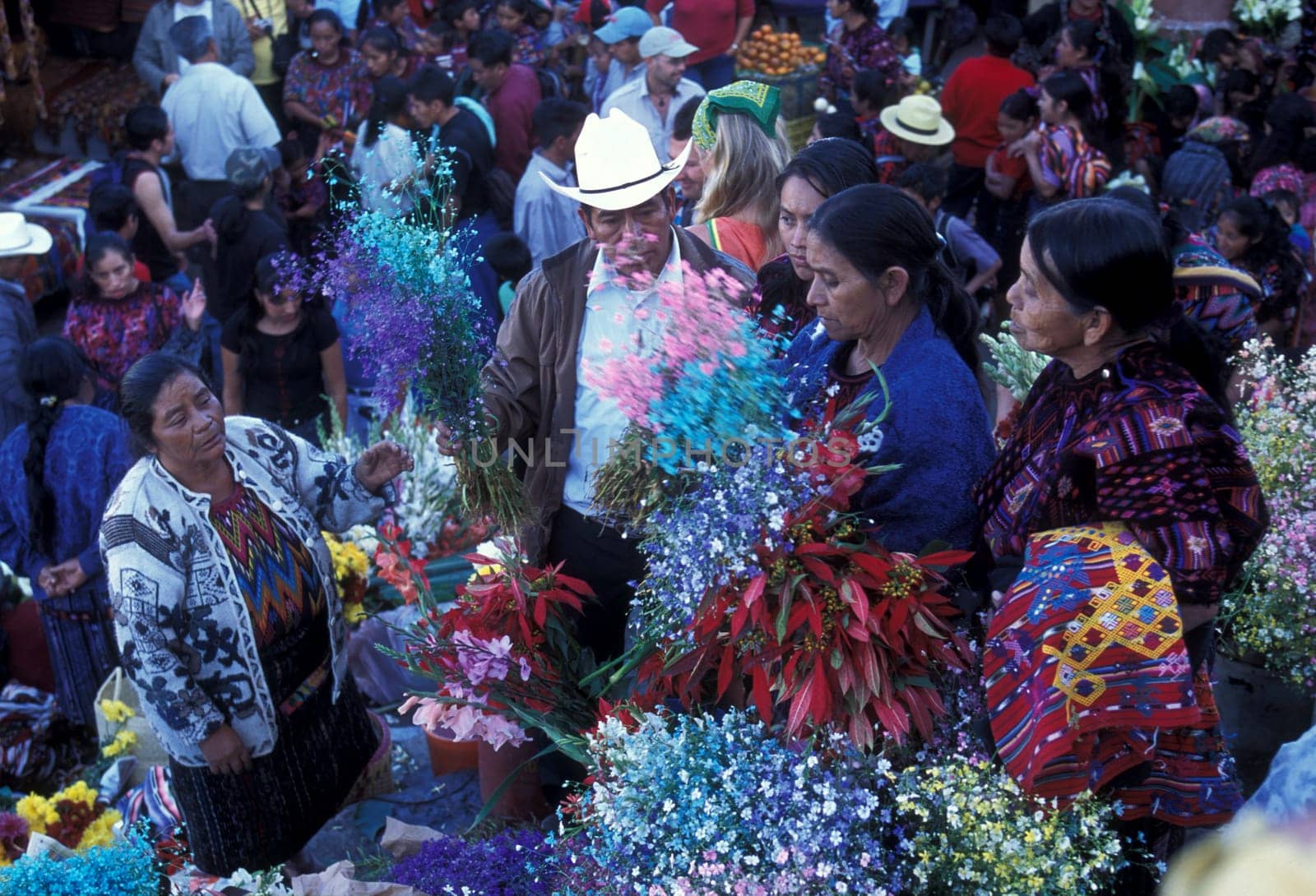 People in traditional clotes at the Market in the Village of Chichi or Chichicastenango in Guatemala in Central America.