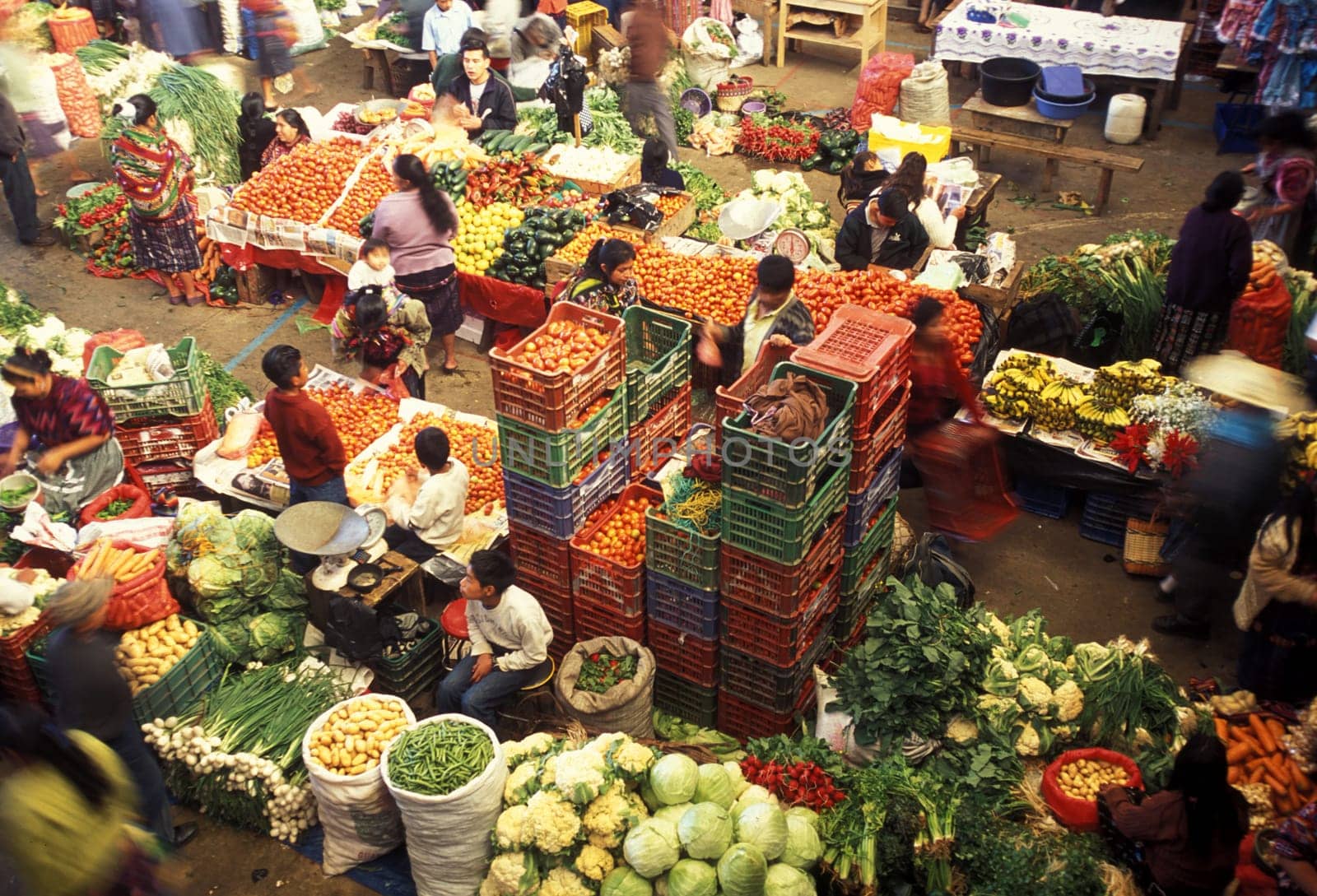 People in traditional clotes at the Market in the Village of Chichi or Chichicastenango in Guatemala in Central America.