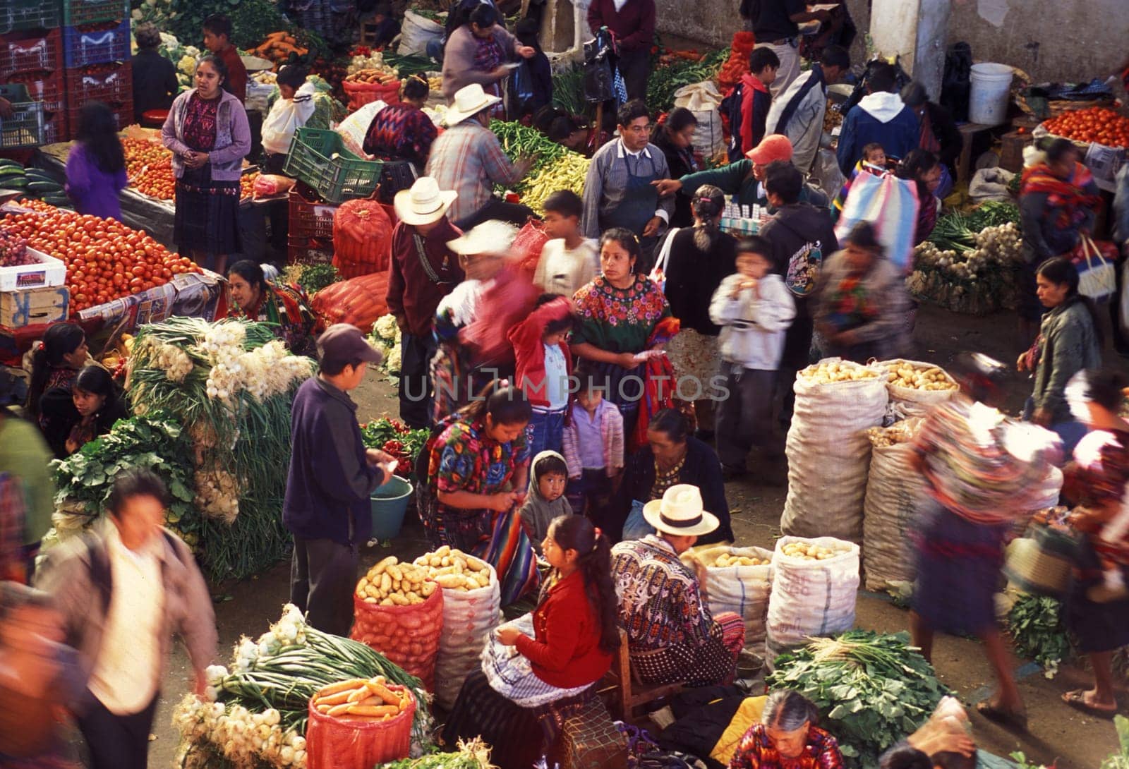People in traditional clotes at the Market in the Village of Chichi or Chichicastenango in Guatemala in Central America.