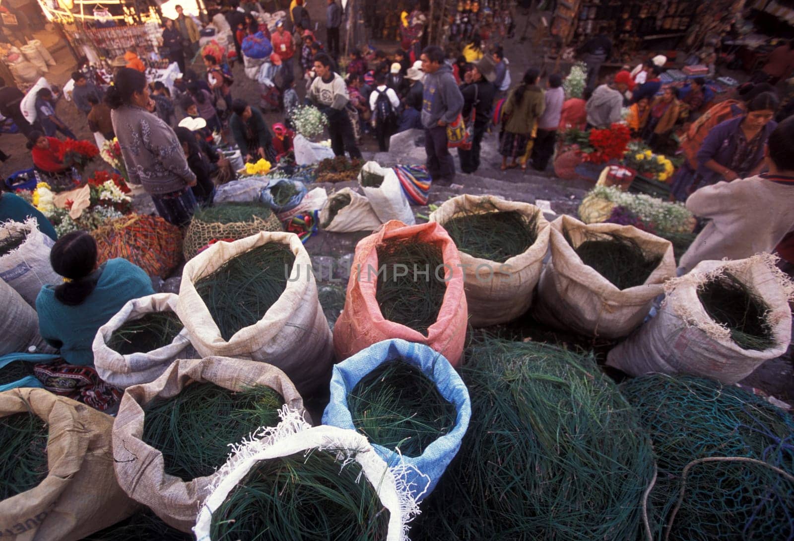 People in traditional clotes at the Market in the Village of Chichi or Chichicastenango in Guatemala in Central America.