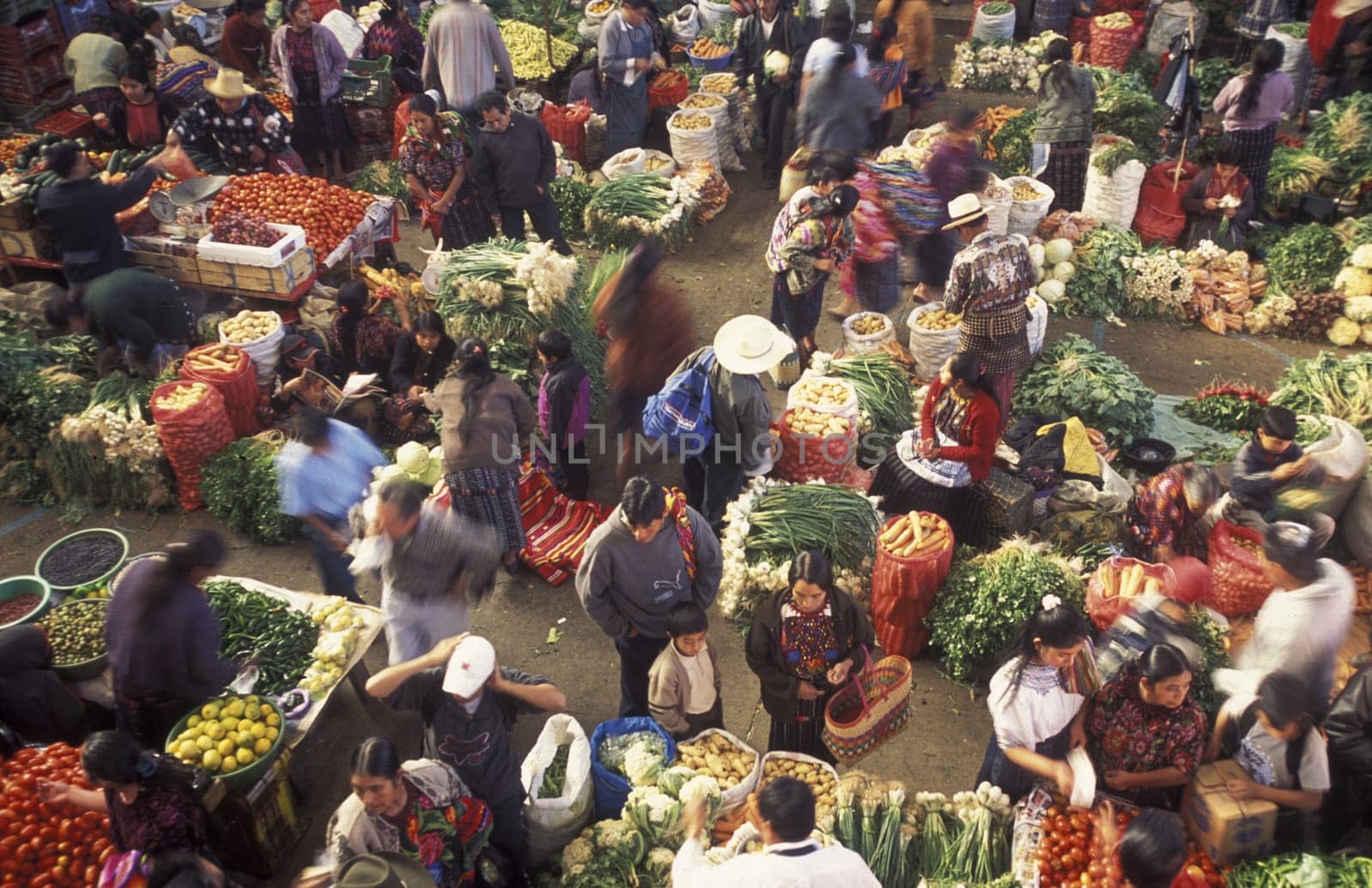 People in traditional clotes in the Village of Chichi or Chichicastenango in Guatemala in Central America.