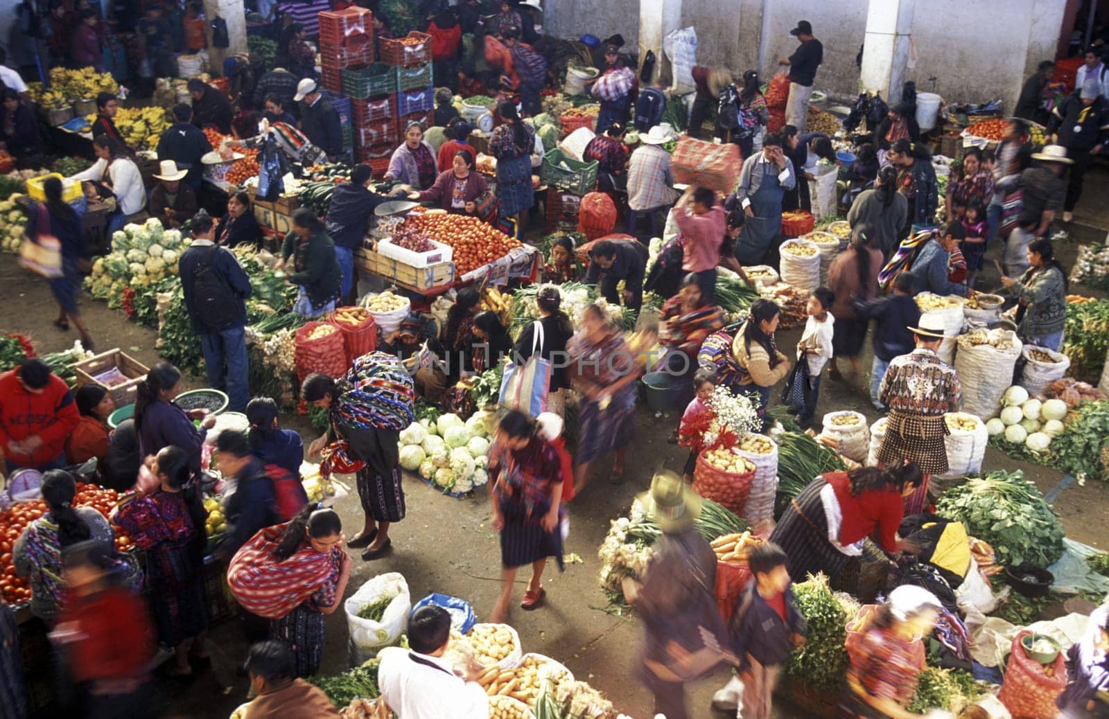 People in traditional clotes in the Village of Chichi or Chichicastenango in Guatemala in Central America.