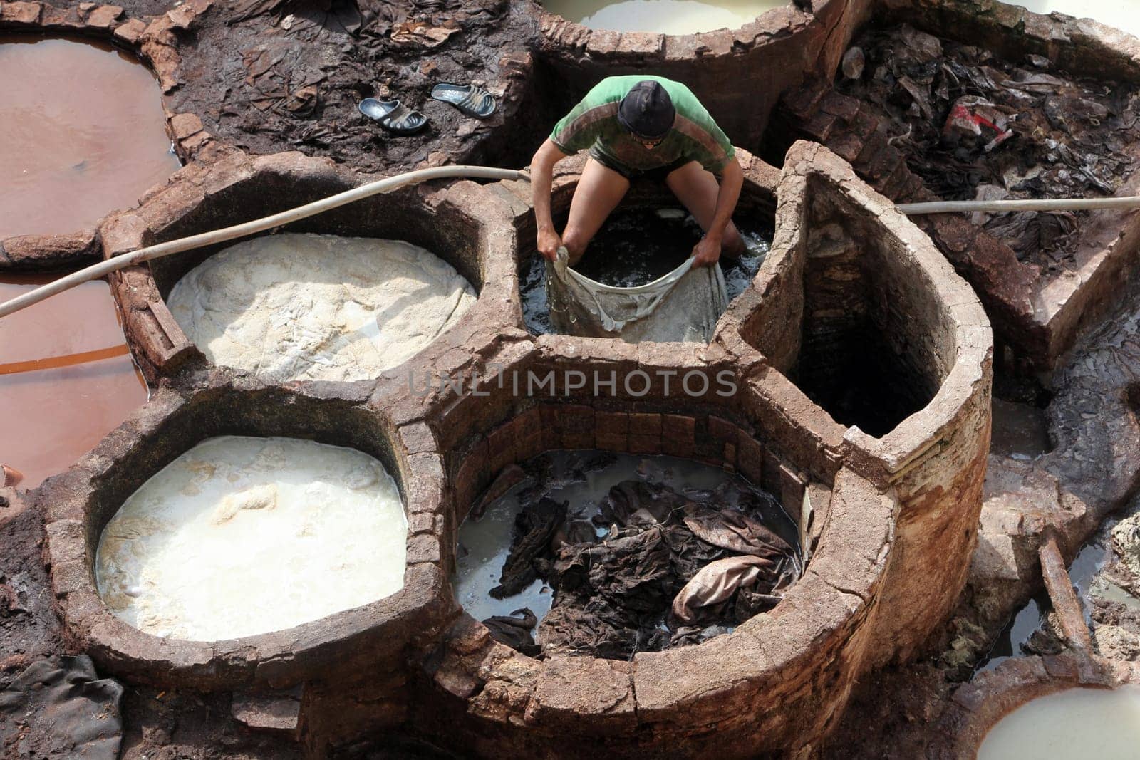 The Leather production in the old City in the historical Town of Fes in Morocco in north Africa.