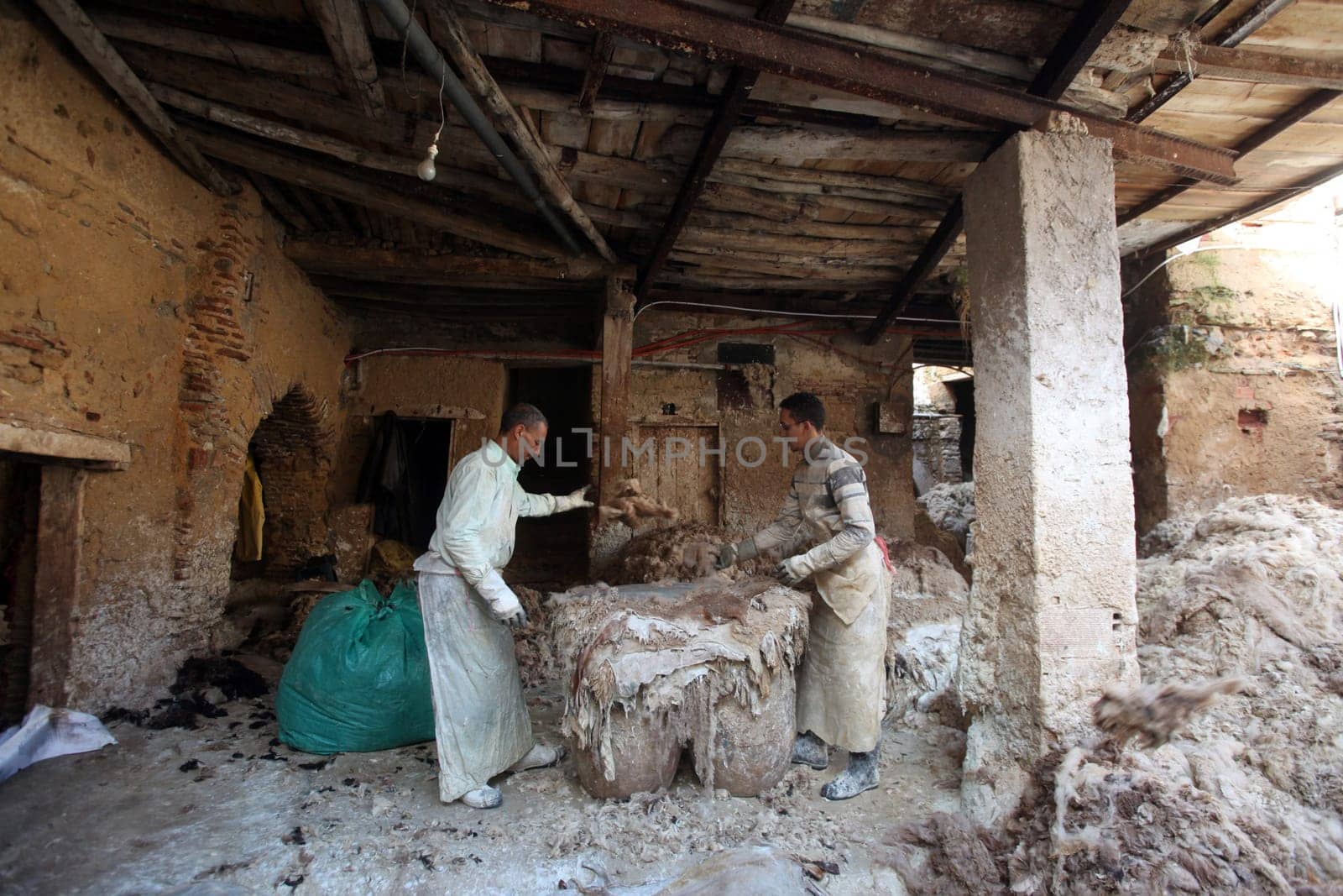 The Leather production in the old City in the historical Town of Fes in Morocco in north Africa.