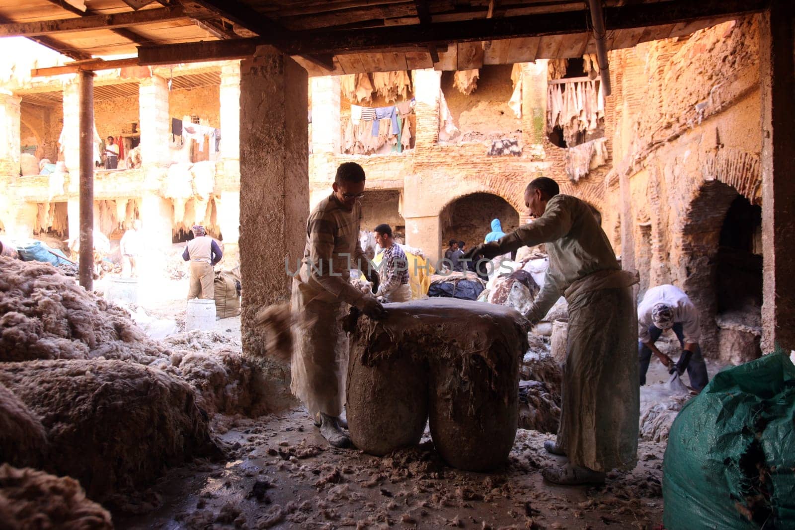 The Leather production in the old City in the historical Town of Fes in Morocco in north Africa.