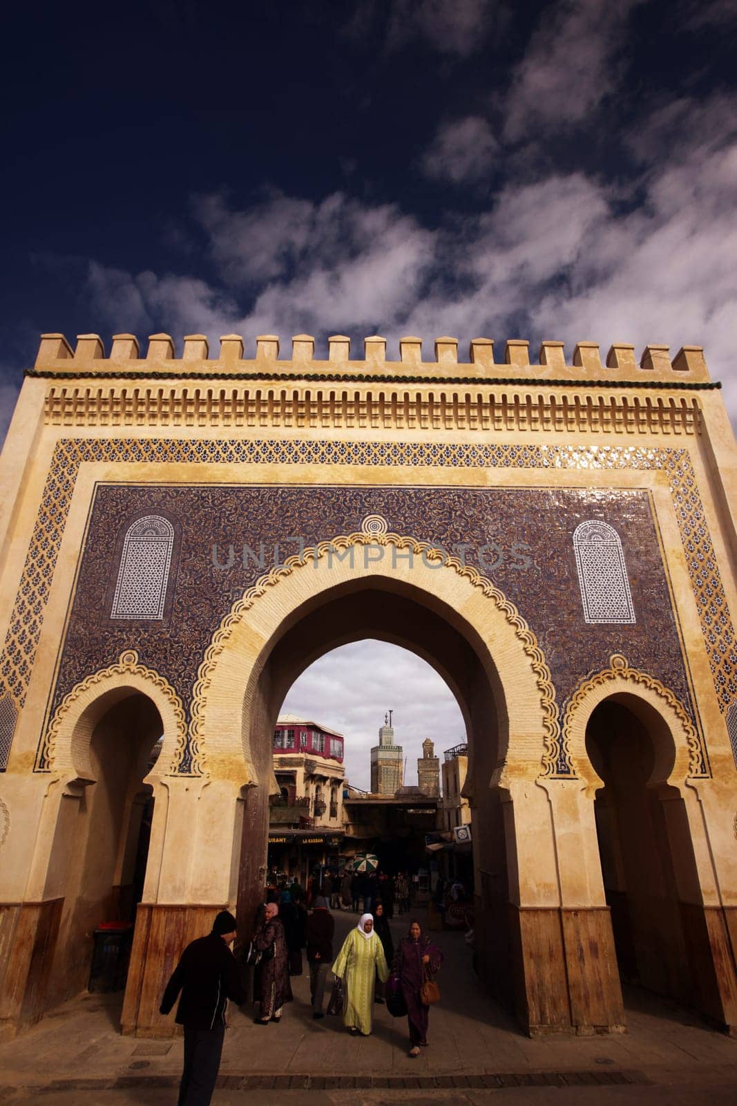 The blue Gate at the Bab Bou Jeloud in the old city in the historic town of Fes in Morocco in north Africa.