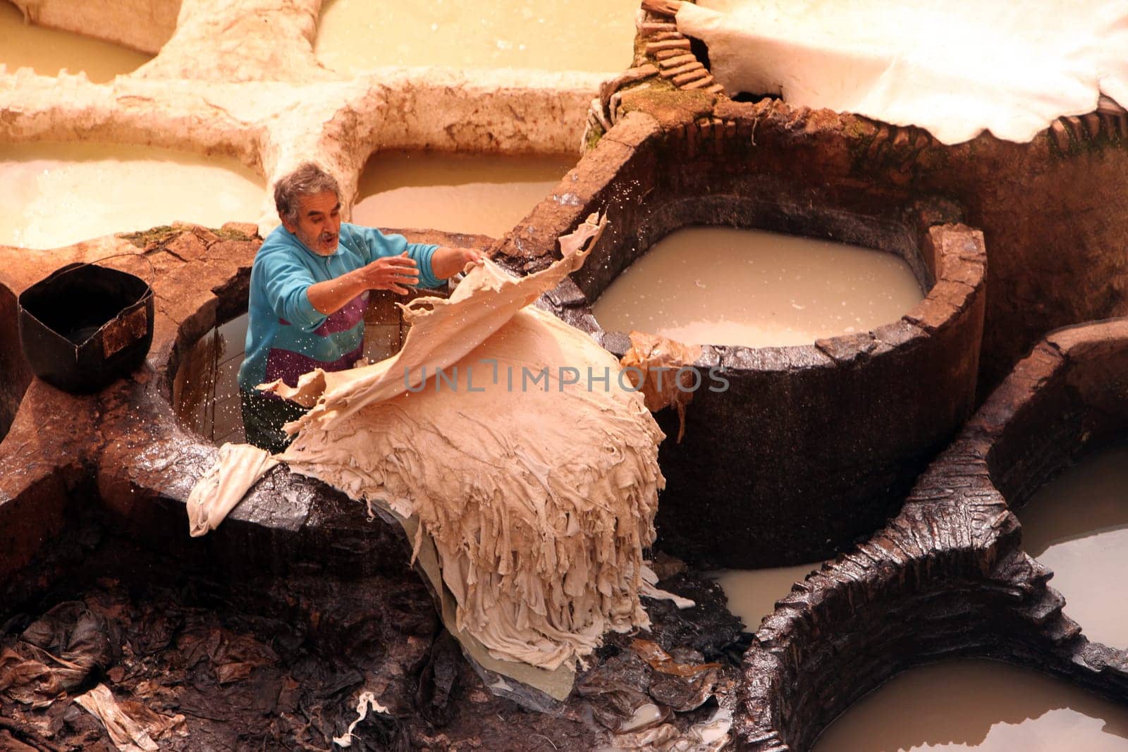 The Leather production in the old City in the historical Town of Fes in Morocco in north Africa.