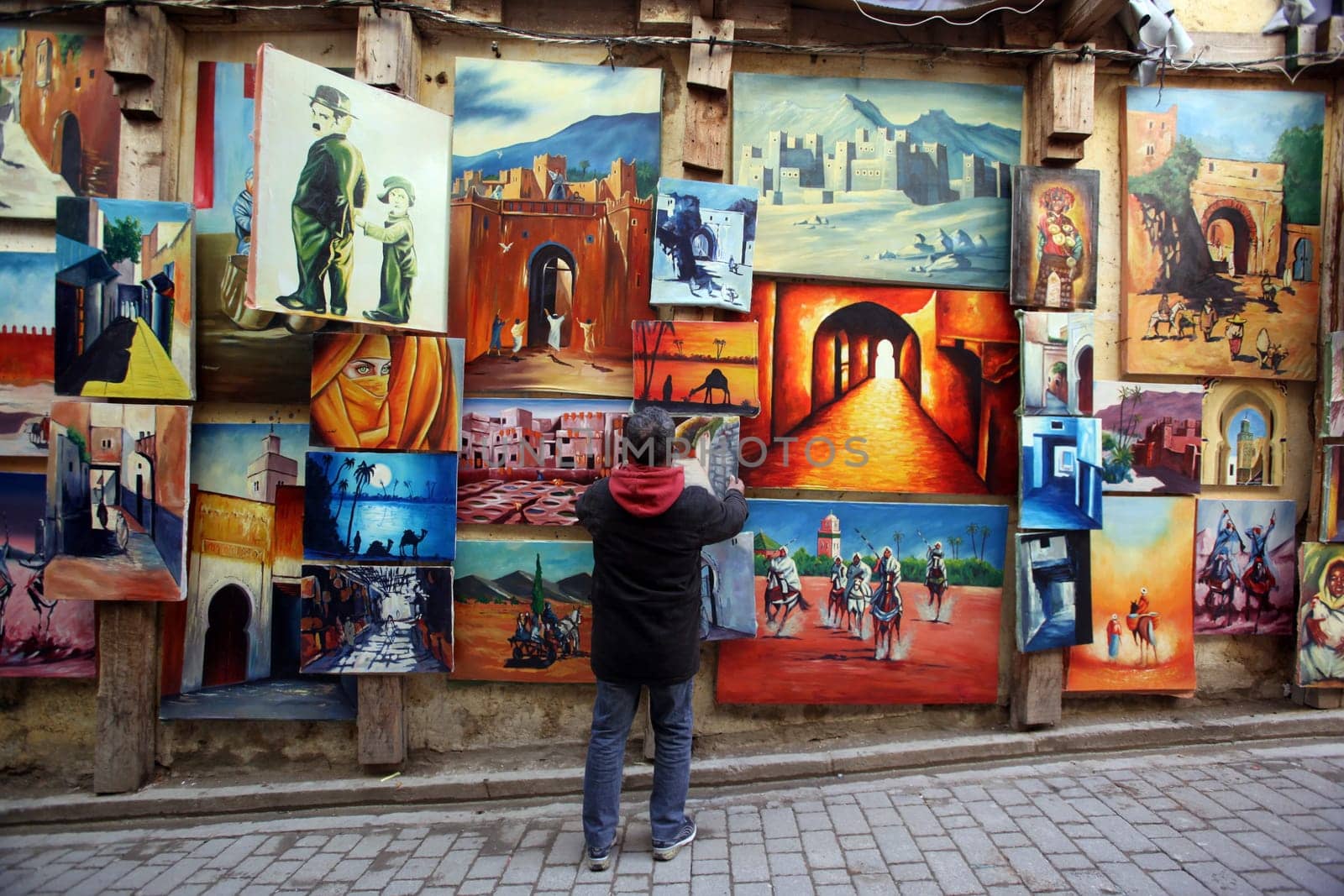 a shop in the Marketroad in the Medina of old City in the historical town of Fes in Morocco in north Africa.