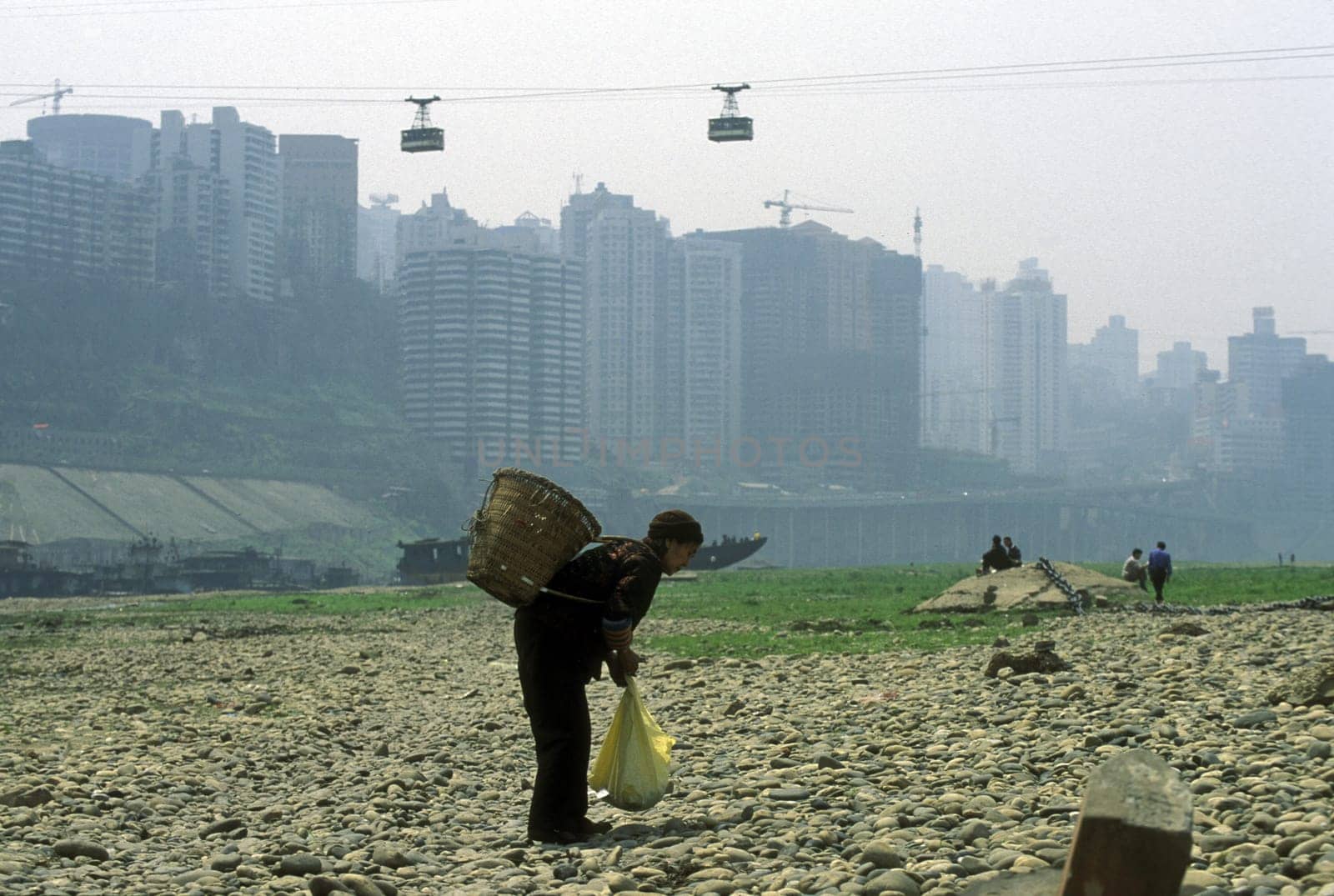 the cable car on the way over the yangzee River in the city of Chongqing in the province of Sichuan in china in east asia.