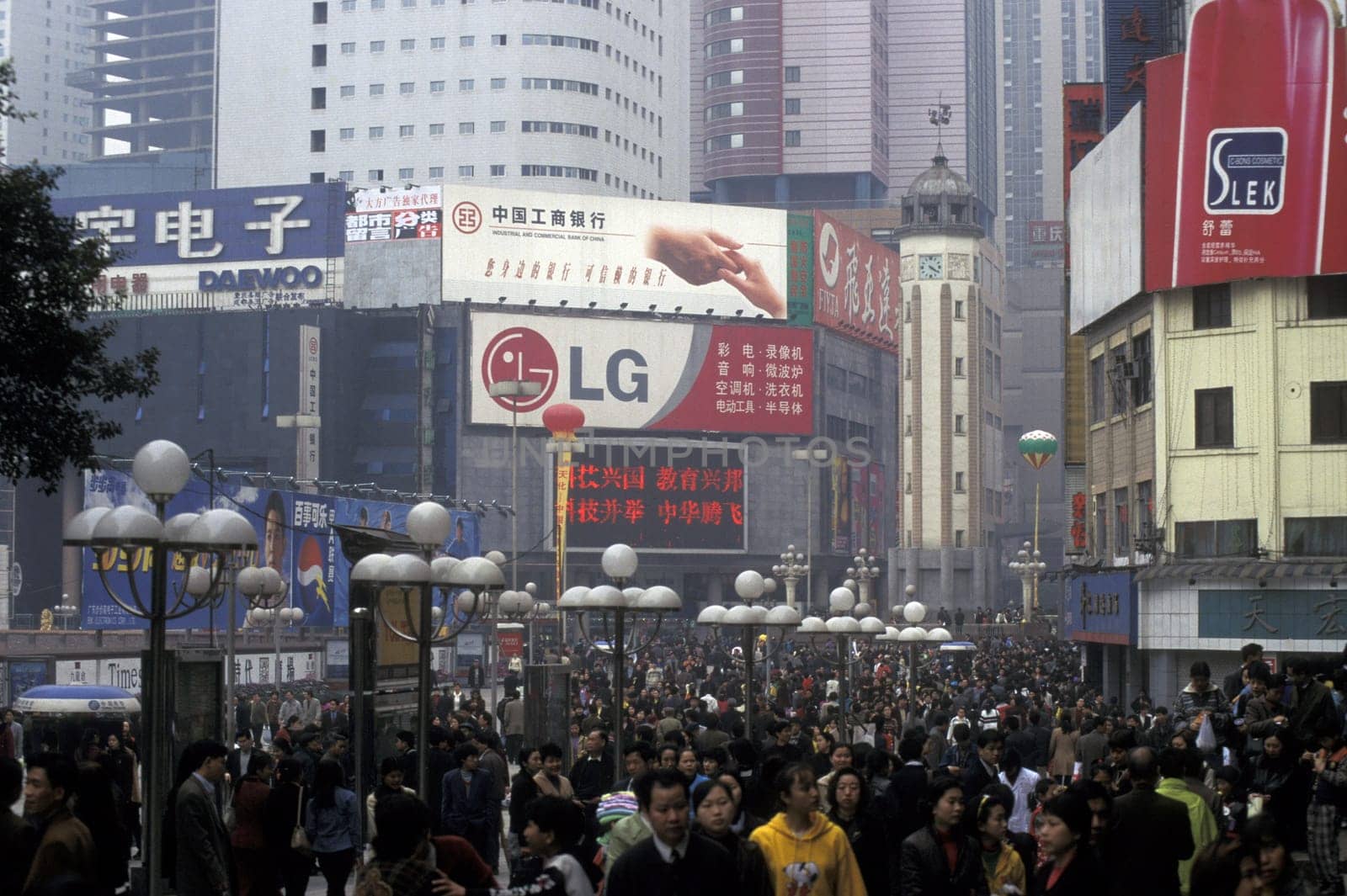 People at the main square in the city of Chongqing in the province of Sichuan in china in east asia.