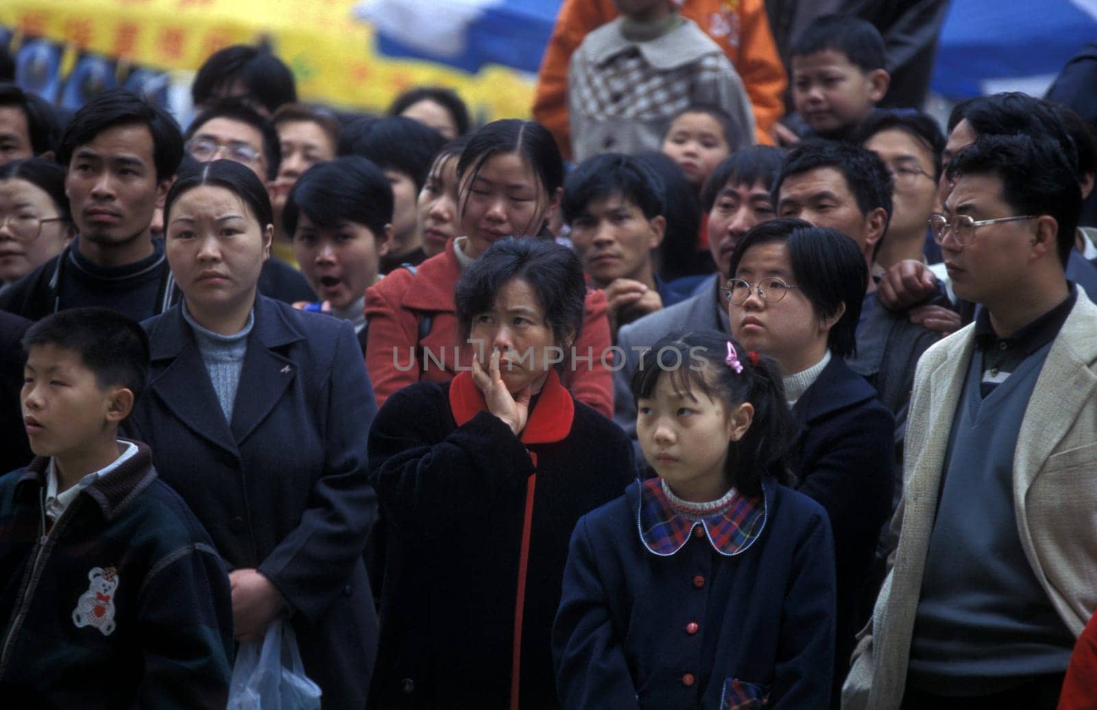 People at the main square in the city of Chongqing in the province of Sichuan in china in east asia.