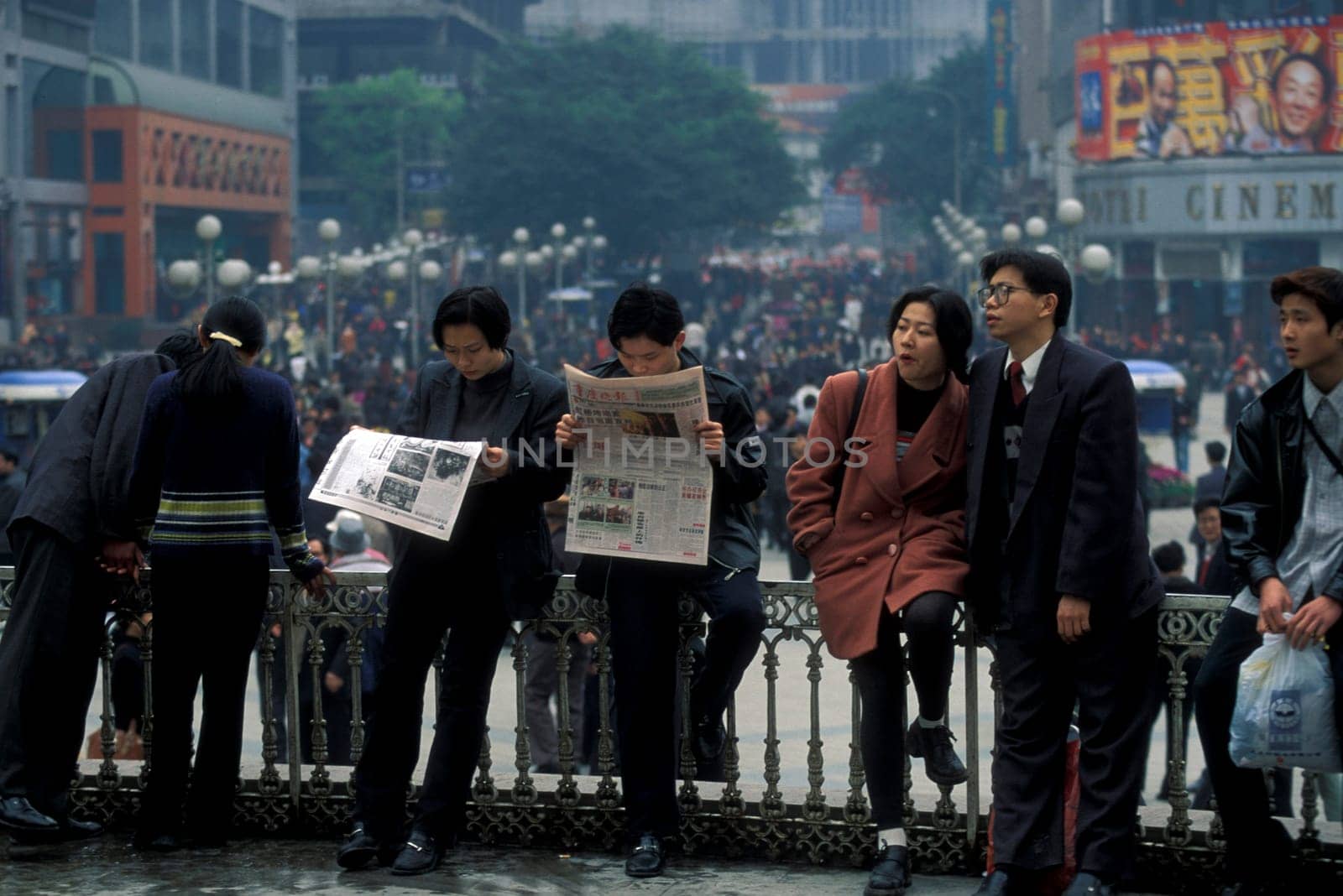 People at the main square in the city of Chongqing in the province of Sichuan in china in east asia.