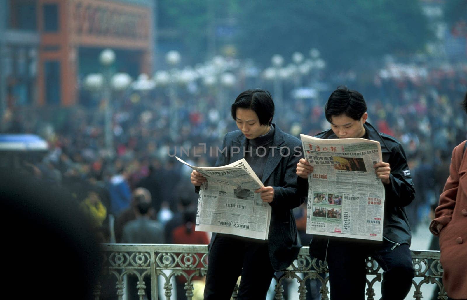 People at the main square in the city of Chongqing in the province of Sichuan in china in east asia.