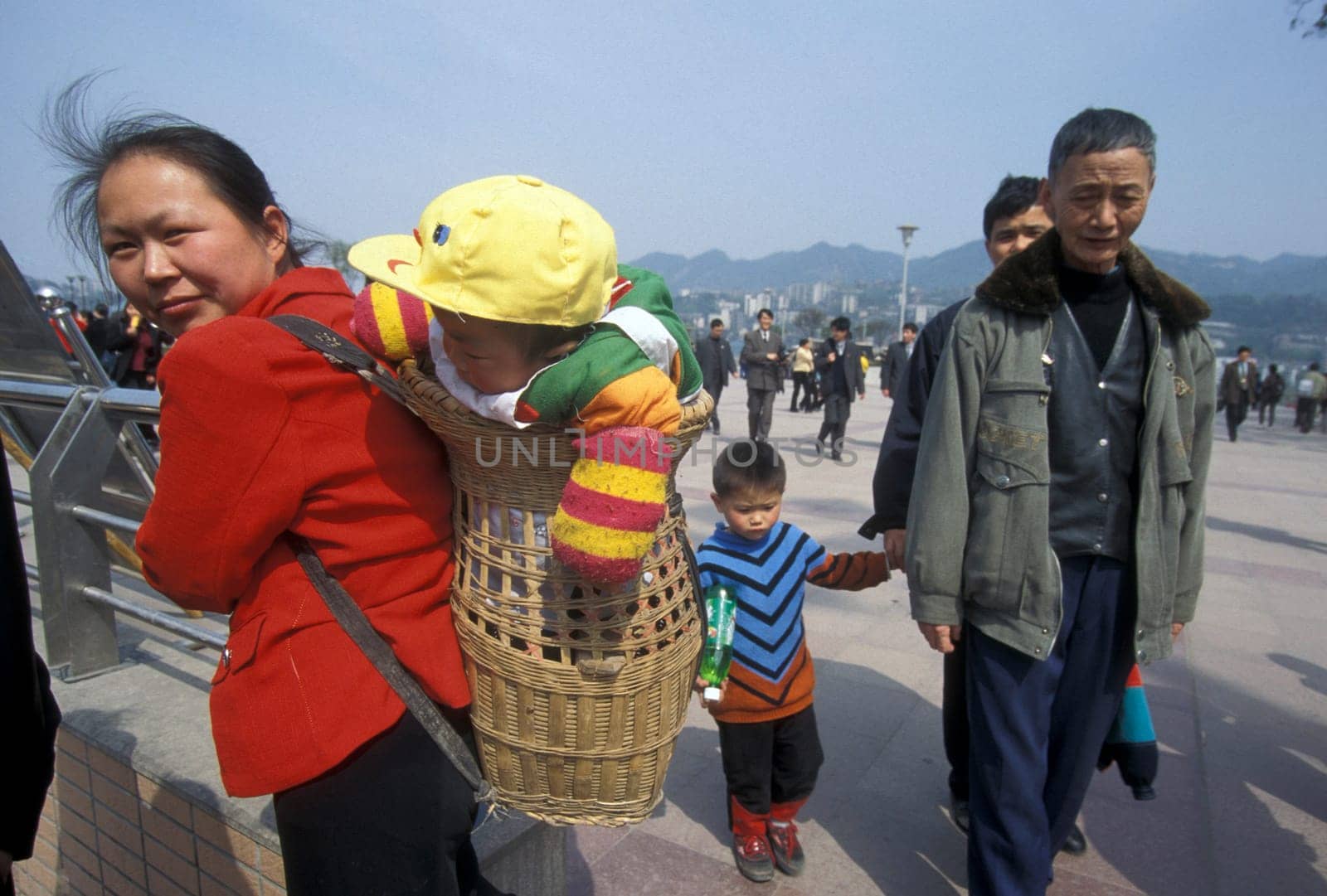 a chinese family with childern in the city of Chongqing in the province of Sichuan in china in east asia.