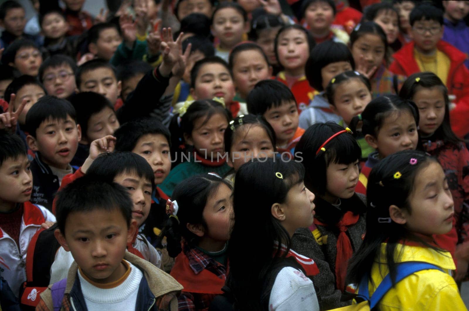 Childern in the city of wushan on the yangzee river near the three gorges valley up of the three gorges dam project in the province of hubei in china.