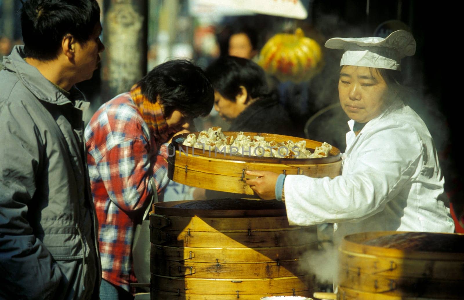 a chinese food stall in the City of Shanghai in china in east asia.