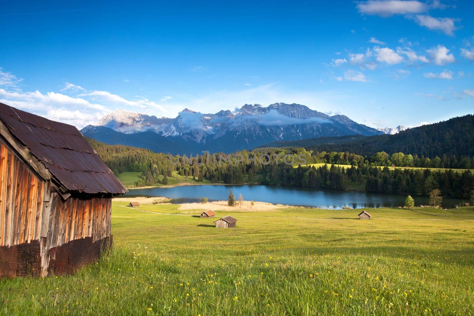 Wooden hut on Lake Gerold see with Karwendel