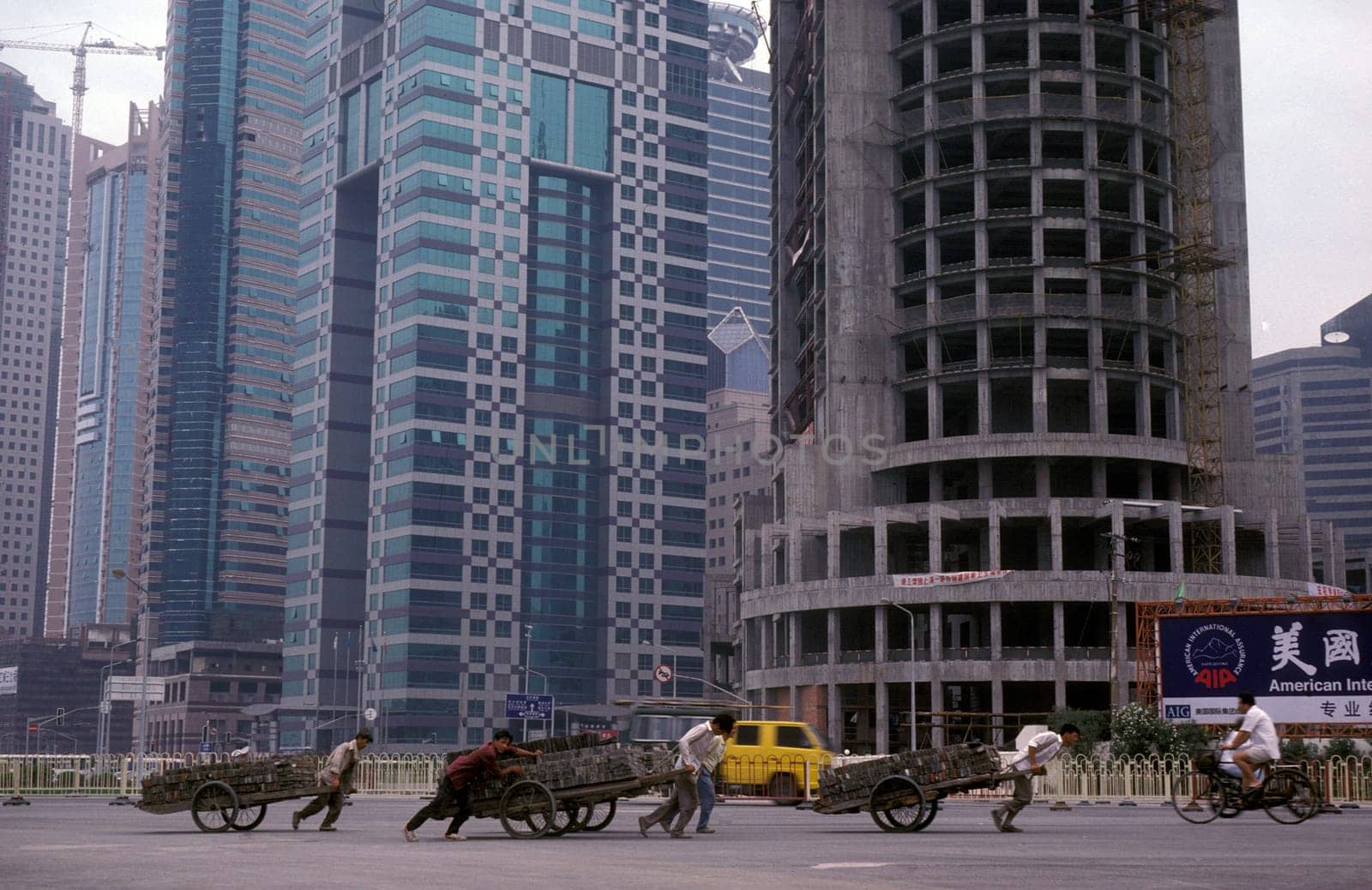 the skyline of Pudong in the City of Shanghai in china in east asia.