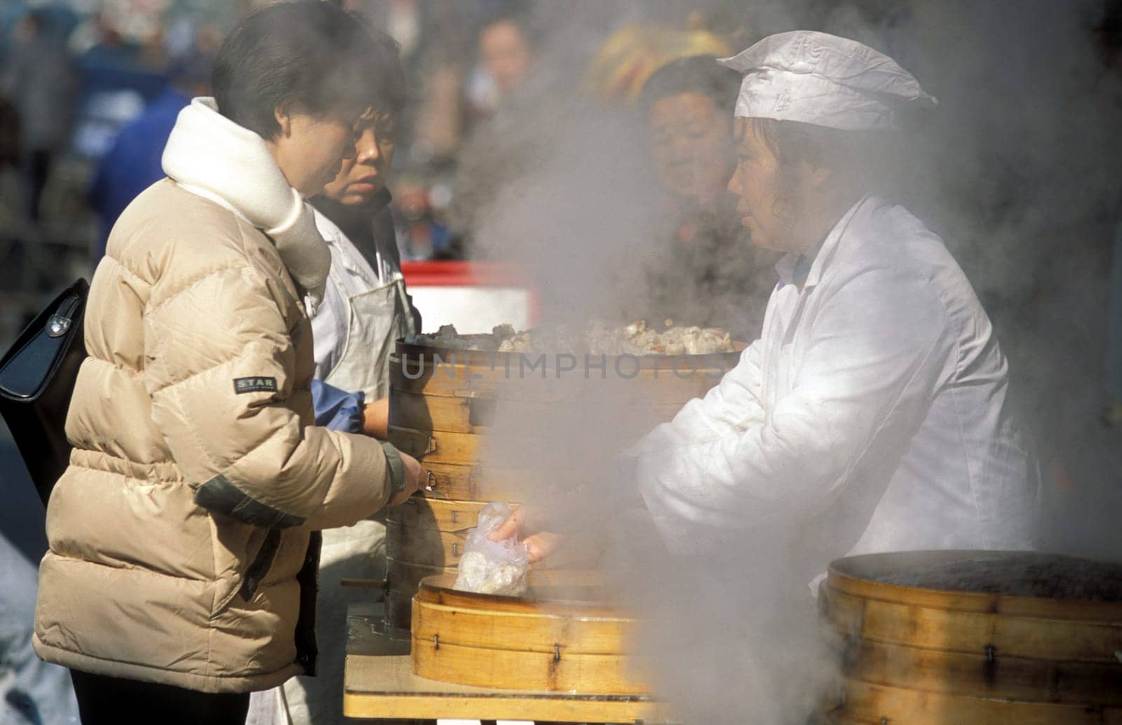 a chinese food stall in the City of Shanghai in china in east asia.