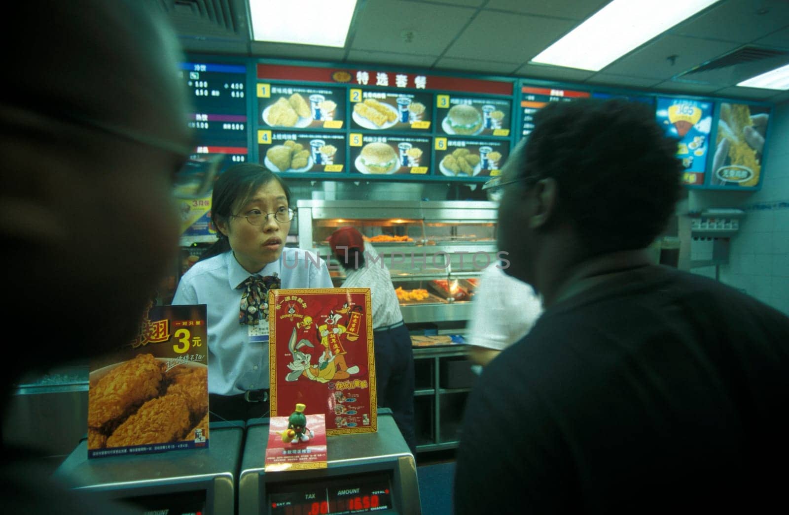 KFC shop in a market street in the city of Shenzhen north of Hongkong in the province of Guangdong in china in east asia.