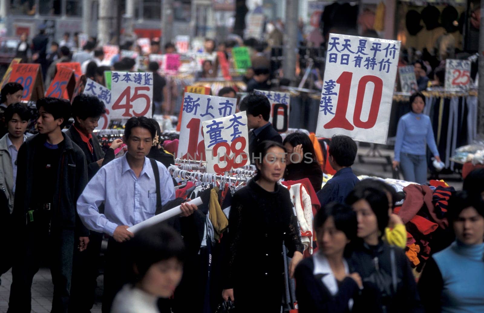 a market street in the city of Shenzhen north of Hong Kong in the province of Guangdong in china in east asia.